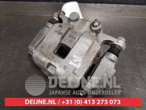 Suzuki Swift Remklauw (Tang) links-voor O435594 foto 2