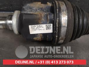 Toyota Verso-S Front drive shaft, left O435757 photo 2