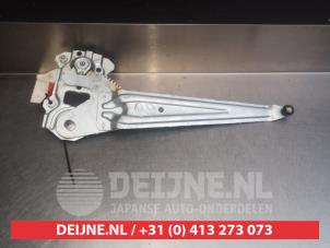 Toyota Yaris Fenstermechanik 4-türig rechts hinten O291712 foto 2
