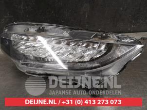 Honda Civic Koplamp links O436122 foto 3
