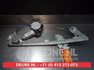 Mazda 323F Fenstermechanik 4-türig rechts hinten O291017 foto 2
