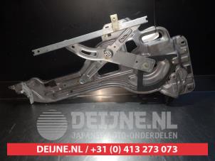 Hyundai Trajet Fenstermechanik 4-türig rechts hinten O291105 foto 2