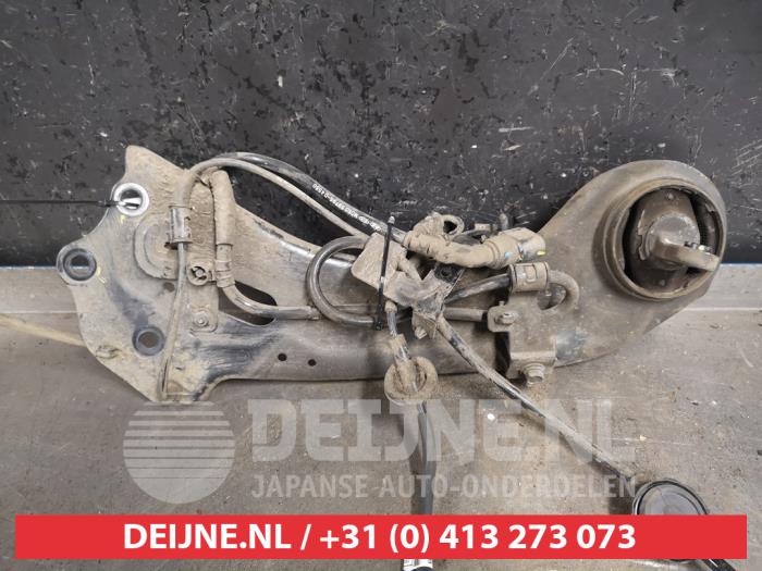 Kia Optima Draagarm links-achter O437841