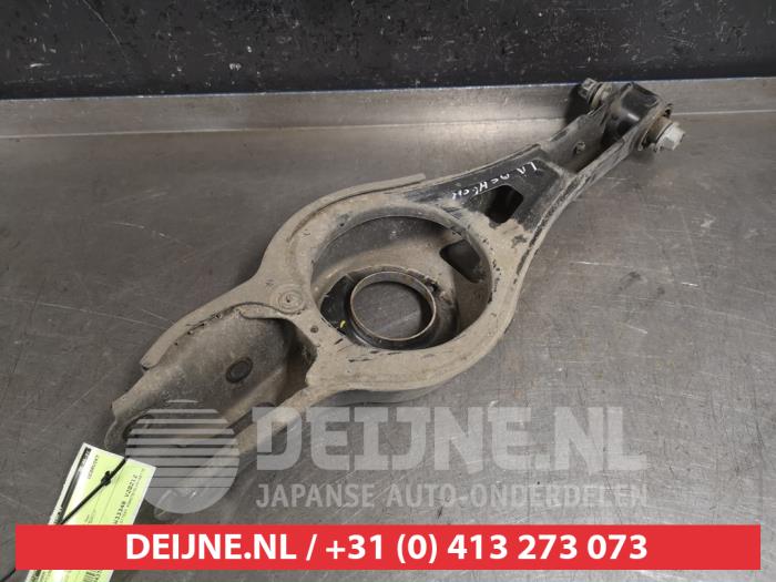 Kia Optima Draagarm links-achter O437845