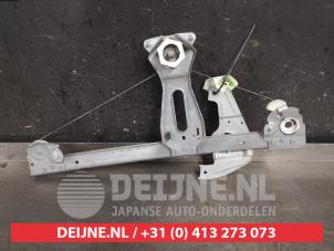 Toyota Aygo Fenstermechanik 2-türig links vorne O439073 foto 2