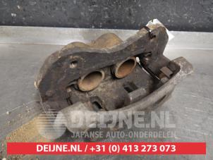 Ssang Yong Kyron Bremszange links vorne O440031 foto 2