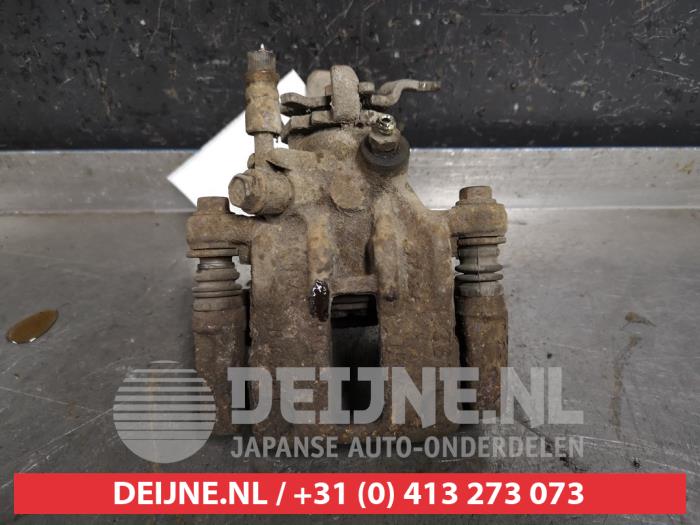 Nissan Almera Tino Remklauw (Tang) rechts-achter O440173