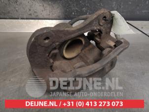 Hyundai Coupe Bremszange rechts vorne O440596 foto 2