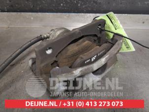 Toyota Aygo Bremszange links vorne O440618 foto 2
