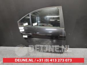 Nissan Primera Portier 4Deurs rechts-achter O440837 foto 2