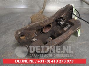 Subaru Forester Bremszange links hinten O440905 foto 2