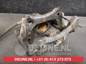 Nissan Micra Bremszange links vorne O442033 foto 2