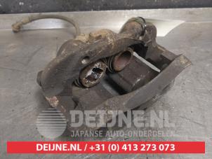 Nissan Terrano Bremszange rechts vorne O443389 foto 2