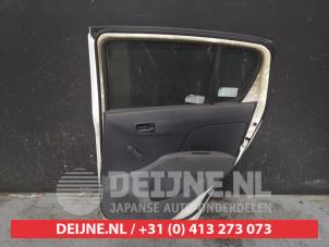 Daihatsu Cuore Tür 4-türig rechts hinten O444707 foto 2