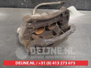Nissan Pathfinder Bremszange links vorne O445915 foto 2
