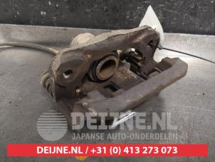 Nissan Pathfinder Rear brake calliper, left O445917 photo 2
