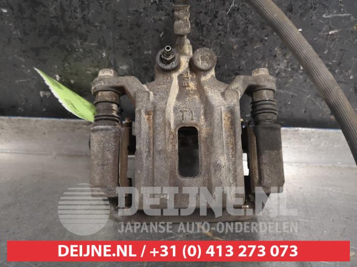 Nissan Pathfinder Remklauw (Tang) rechts-achter O445922