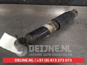 Nissan Pathfinder Schokdemper rechts-achter O445923 foto 2