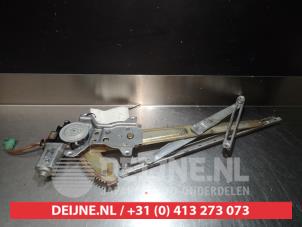 Daihatsu Cuore Window mechanism 2-door, front left O275392 photo 2