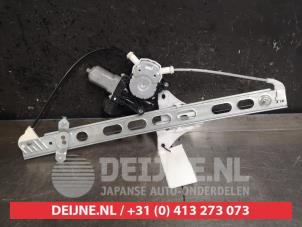 Suzuki Swift Fenstermechanik 4-türig links vorne O449896 foto 2