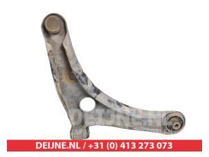 Mitsubishi Colt Front lower wishbone, left O450503 photo 2