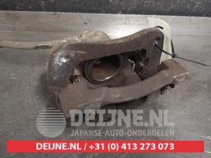 Suzuki Ignis Front brake calliper, left O450673 photo 2