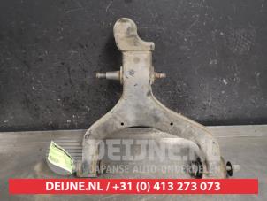 Ssang Yong Rexton Querlenker unten links vorne O450877 foto 2