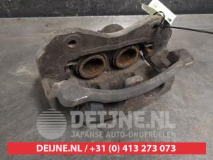 Ssang Yong Rexton Front brake calliper, left O450884 photo 2