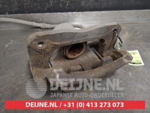 Ssang Yong Rexton Bremszange links hinten O450887 foto 2