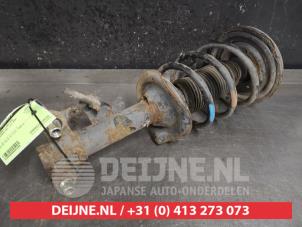 Nissan Primera Stoßdämpferstrebe links vorne O451386 foto 2