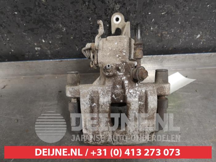 Nissan Primera Remklauw (Tang) links-achter O451391