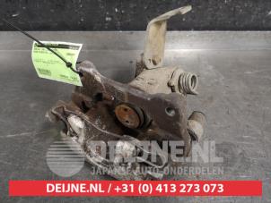 Nissan Primera Rear brake calliper, left O451391 photo 2