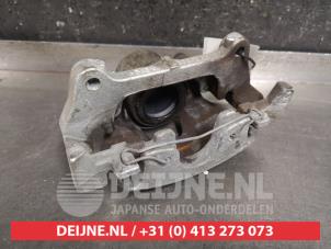Toyota Yaris Bremszange links vorne O451766 foto 2