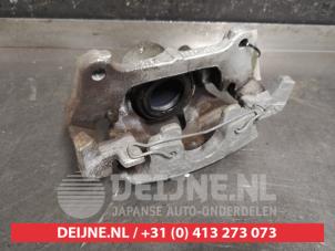 Toyota Yaris Front brake calliper, right O451767 photo 2