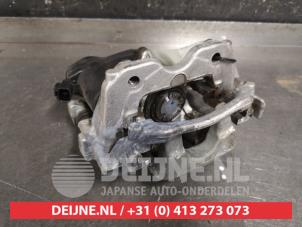 Toyota Yaris Rear brake calliper, left O451769 photo 2