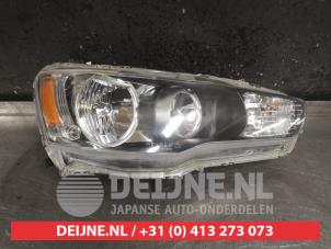 Mitsubishi Lancer Koplamp rechts O451950 foto 2