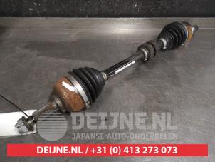 Nissan Micra Antriebswelle links vorne O452668 foto 2