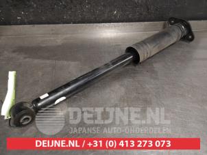 Nissan Micra Schokdemper rechts-achter O452676 foto 2