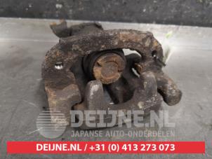 Mitsubishi Carisma Remklauw (Tang) links-achter O454389 foto 2