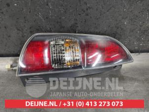 Daihatsu Sirion Achterlicht links O455420 foto 2