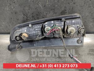 Daihatsu Sirion Achterlicht links O455420 foto 3