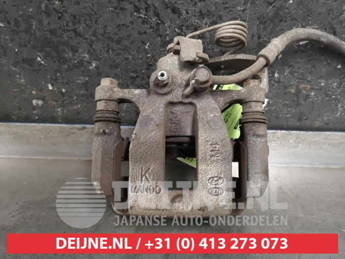 Kia Rio Remklauw (Tang) links-achter O455779