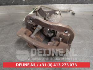 Kia Rio Remklauw (Tang) links-achter O455779 foto 2