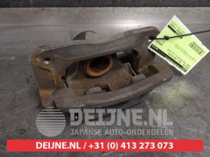Ssang Yong Rexton Rear brake calliper, left O455990 photo 2