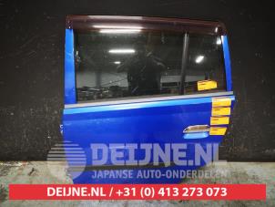 Daihatsu Cuore Tür 4-türig links hinten O457063 foto 2