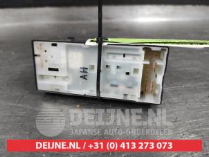 Nissan Micra Multi-functional window switch O459531 photo 2