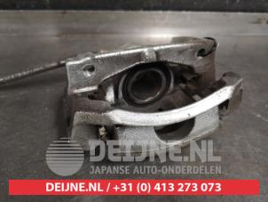Toyota Aygo Bremszange links vorne O460056 foto 2