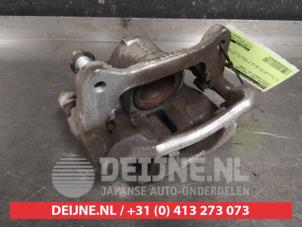 Toyota Corolla Bremszange links vorne O460834 foto 2