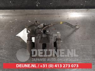 Kia Picanto Bremszange rechts hinten O461020 photo 2