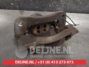 Suzuki Ignis Front brake calliper, left O461507 photo 2